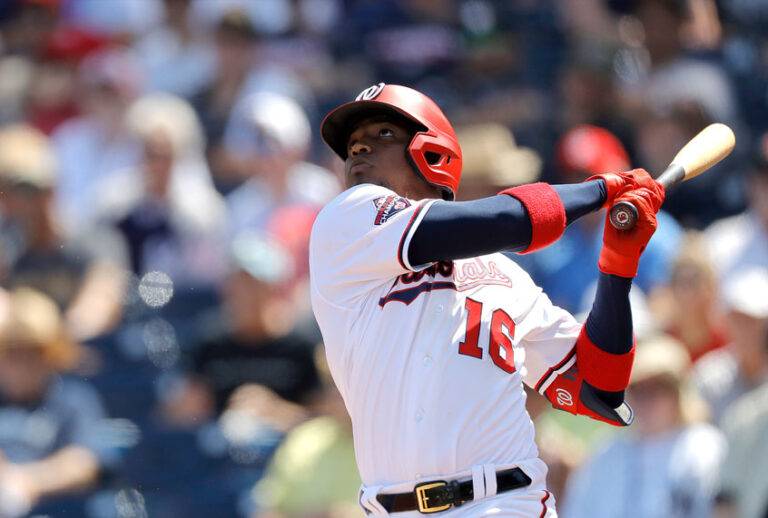 Washington Nationals' Victor Robles watches his ball as he hits a solo home run off New York Yankees pitcher Jonathan Loaisiga during the third inning of a spring training baseball game, Thursday, March 12, 2020, in West Palm Beach, Fla. (AP Photo/Julio Cortez)