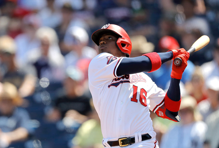 Washington Nationals' Victor Robles watches his ball as he hits a solo home run off New York Yankees pitcher Jonathan Loaisiga during the third inning of a spring training baseball game, Thursday, March 12, 2020, in West Palm Beach, Fla. (AP Photo/Julio Cortez)