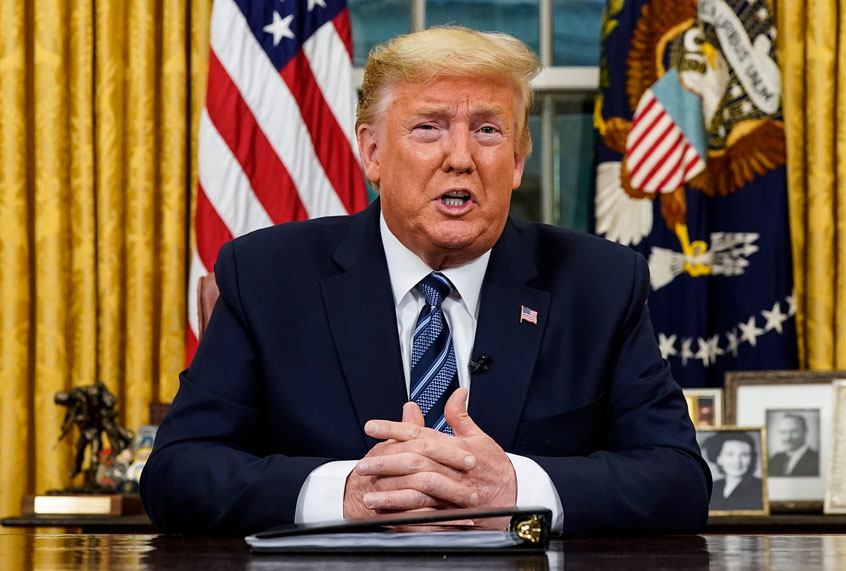 President Donald Trump speaks in an address to the nation from the Oval Office at the White House about the coronavirus Wednesday, March, 11, 2020, in Washington. (Doug Mills/The New York Times via AP, Pool)