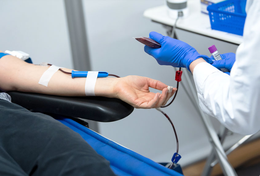 Blood is drawn from a young woman ( Bernd von Jutrczenka/picture alliance via Getty Images)