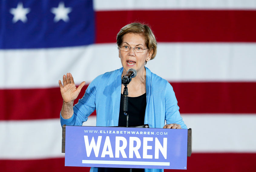 Democratic presidential candidate Sen. Elizabeth Warren, D-Mass., speaks to supporters during a town hall Saturday, Feb. 29, 2020, at Discovery Green in Houston. (AP Photo/Michael Wyke)