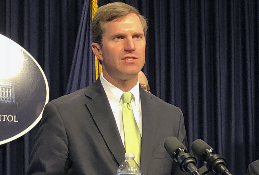 Kentucky Gov. Andy Beshear discusses developments in Kentucky regarding the new coronavirus in Frankfort, Ky. (AP Photo/Bruce Schreiner)