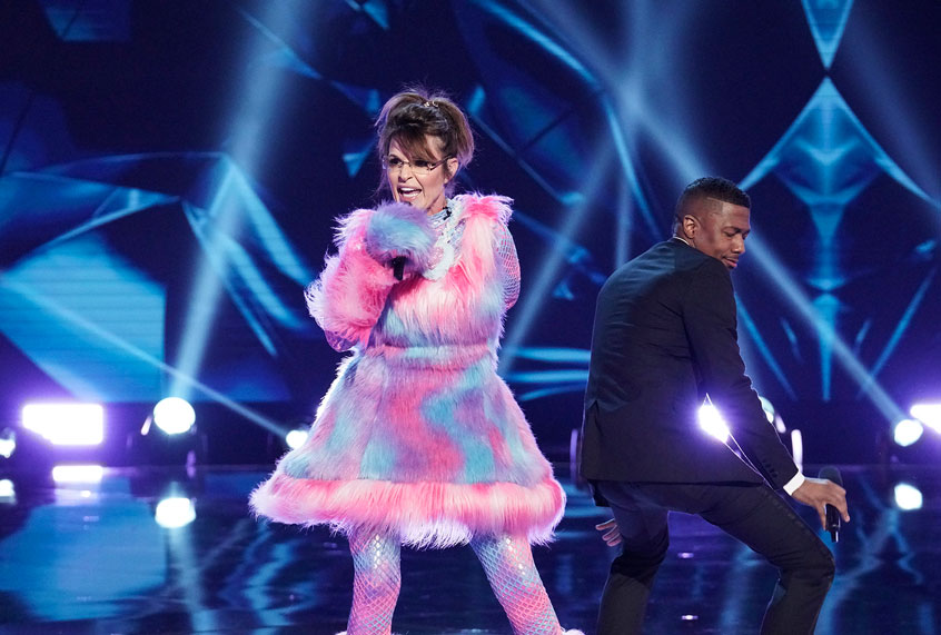 THE MASKED SINGER: L-R: Sarah Palin and Host Nick Cannon in the “Last But Not Least: Group C Kickoff!” episode of THE MASKED SINGER airing Wednesday, March 11 (8:00-9:01 PM ET/PT) on FOX. (Michael Becker / FOX. © FOX Media LLC.)