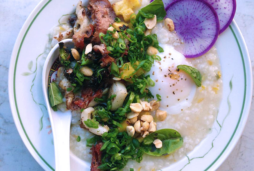 Carolina gold rice congee, six pepper squid, ham, grilled pineapple peanuts (Milktooth, Indianapolis)