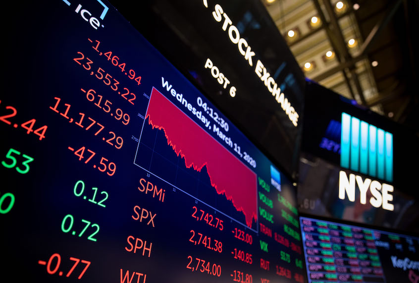 Screens show trading data at the New York Stock Exchange in New York, the United States, on March 11, 2020. (Michael Nagle/Xinhua via Getty)