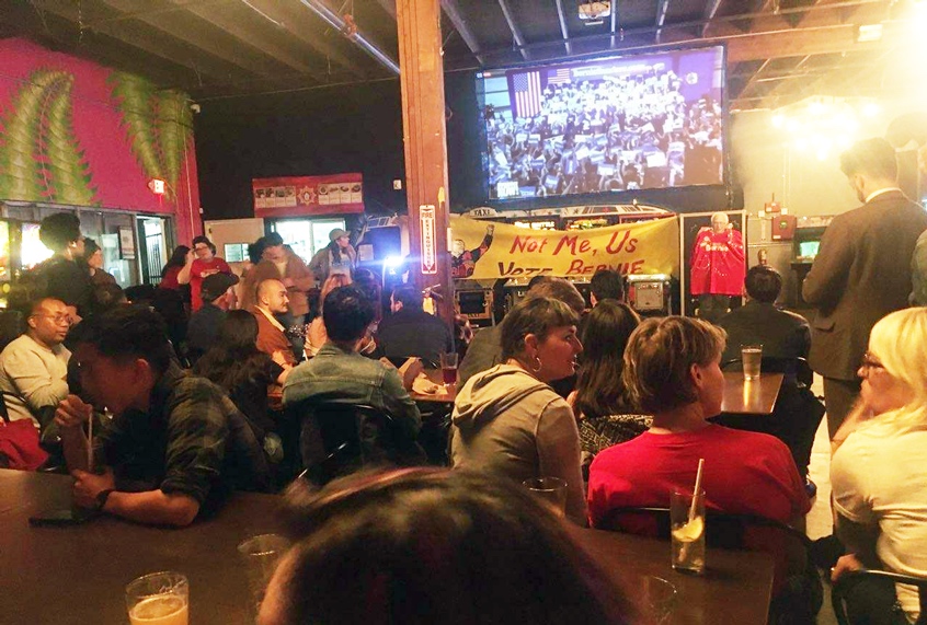 Members of the East Bay chapter of the Democratic Socialists of America gather at a bar in West Oakland to watch the results of the primaries on Super Tuesday, March 3, 2020. Sen. Sanders was triumphant in the California primary. (Salon/Nicole Karlis)
