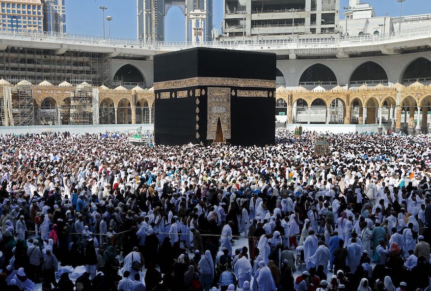 Muslim pilgrims walk around the Kaaba (Tawaf al-Wadaa), Islam's holiest shrine, at the Grand Mosque in Saudi Arabia's holy city of Mecca on February 27, 2020. (Abdel Ghani Bashir/AFP via Getty Images)