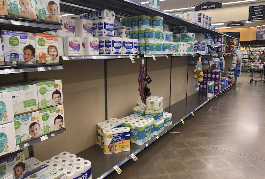 An aisle of toilet paper is nearly empty at a Kroger grocery store. (Jeremy Hogan/SOPA Images/LightRocket via Getty Images)