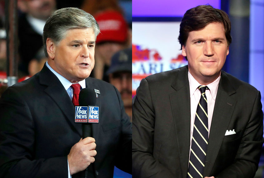Sean Hannity and Tucker Carlson (AP Photo/Richard Drew/Jeff Roberson)