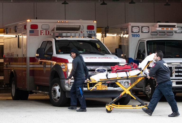 Emergency Medical Technicians wheel a collapsible wheeled stretcher into the emergency room at NewYork-Presbyterian Lower Manhattan Hospital, Wednesday, March 18, 2020, in New York. (AP Photo/Mary Altaffer)