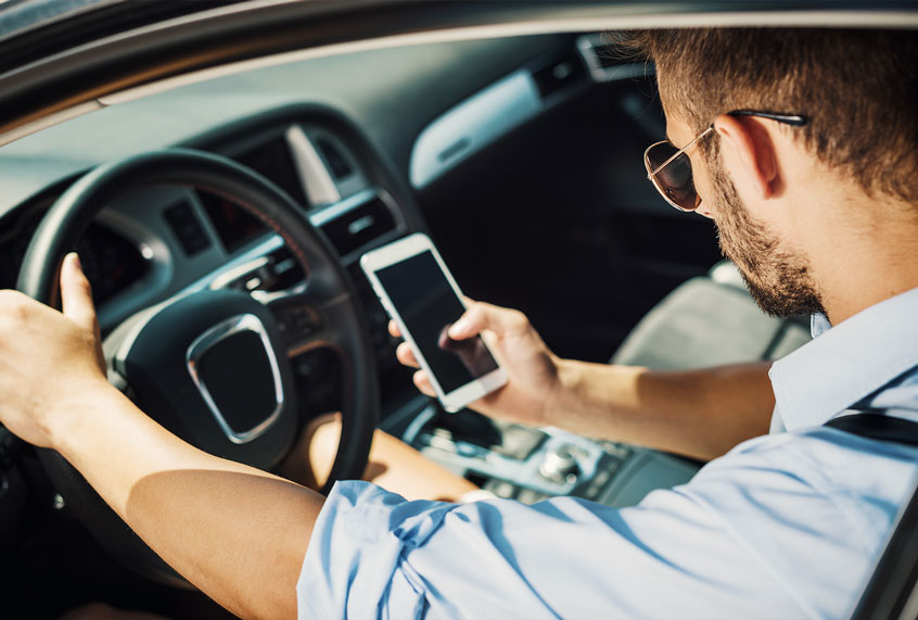 Man is using ridesharing service app to provide driving service to new customers (Getty Images)