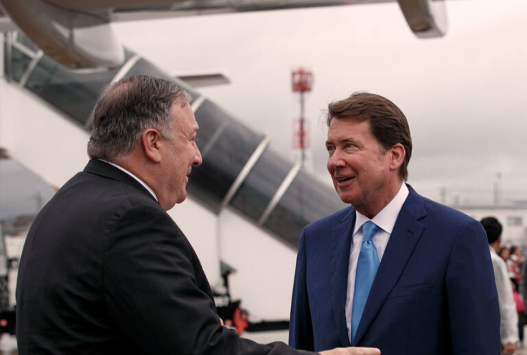 Secretary of State Mike Pompeo, left, talks with U.S. Ambassador to Japan Bill Hagerty as Pompeo arrives in Osaka, Japan (AP Photo/Jacquelyn Martin)