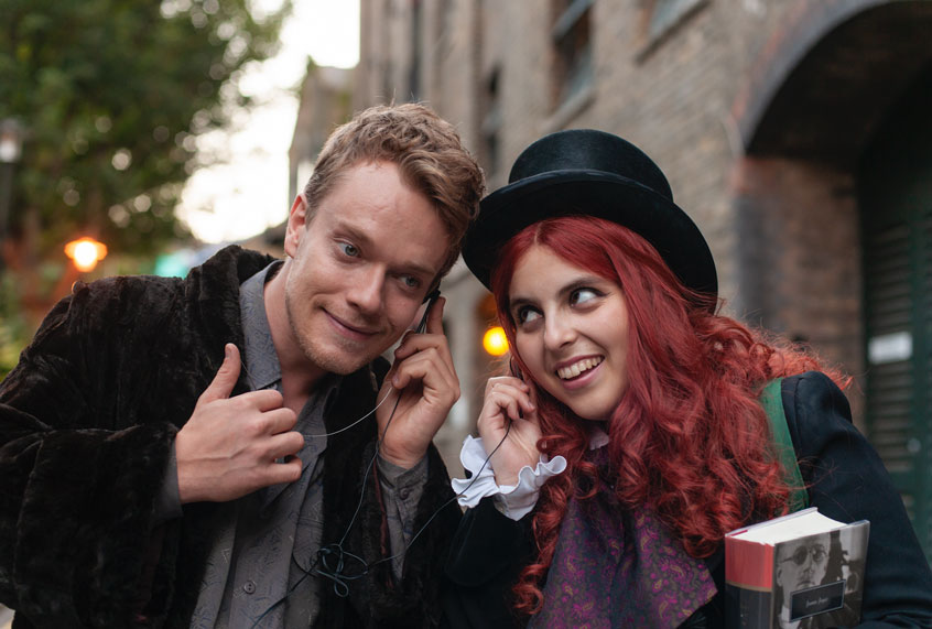 Alfie Allen and Beanie Feldstein in "How to Build a Girl" (IFC Films)