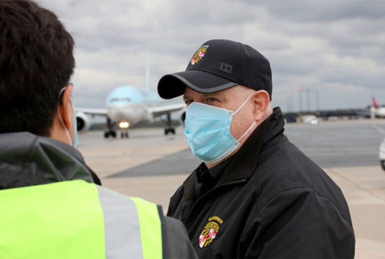 Maryland Governor Larry Hogan and First Lady Yumi Hogan welcome a Korean Air passenger plane carrying a load of COVID-19 test kits on Saturday, April 18. (Office of the Governor)
