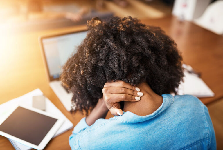 Rearview shot of a stressed young woman (Getty Images)
