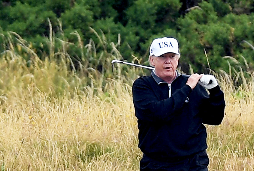 U.S. President Donald Trump plays a round of golf (Leon Neal/Getty Images)