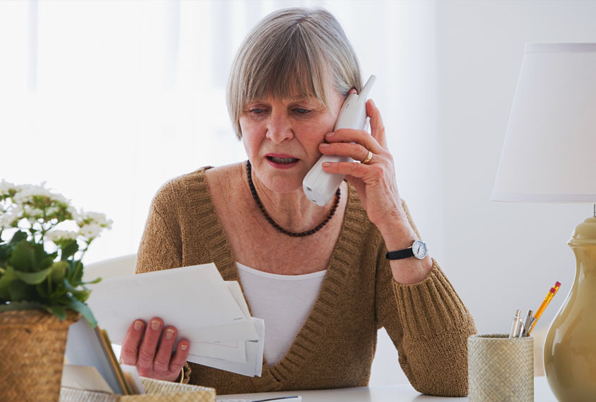 Senior woman on the phone (Getty Images)