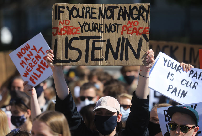 Protestors take part in a Black Lives Matter march (PETRAS MALUKAS/AFP via Getty Images)