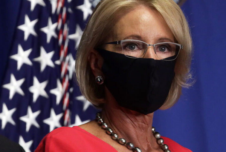 U.S. Secretary of Education Betsy DeVos listens during a White House Coronavirus Task Force press briefing at the U.S. Department of Education July 8, 2020 in Washington, DC. Vice President Pence and the task force members discussed the latest on the COVID-19 pandemic and the reopening of nation's schools in the Fall. (Alex Wong/Getty Images)