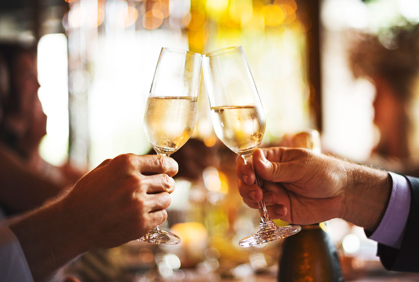 Toasting with champagne (Getty Images)