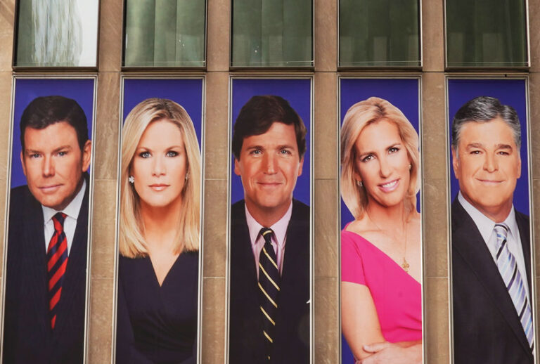 Advertisements featuring Fox News personalities, including Bret Baier, Martha MacCallum, Tucker Carlson, Laura Ingraham, and Sean Hannity, adorn the front of the News Corporation building, (Getty Images/Drew Angerer/Getty Images)