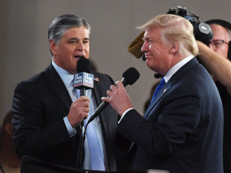 LAS VEGAS, NV - SEPTEMBER 20: Fox News Channel and radio talk show host Sean Hannity (L) interviews U.S. President Donald Trump before a campaign rally at the Las Vegas Convention Center on September 20, 2018 in Las Vegas, Nevada. (Photo by Ethan Miller/Getty Images)
