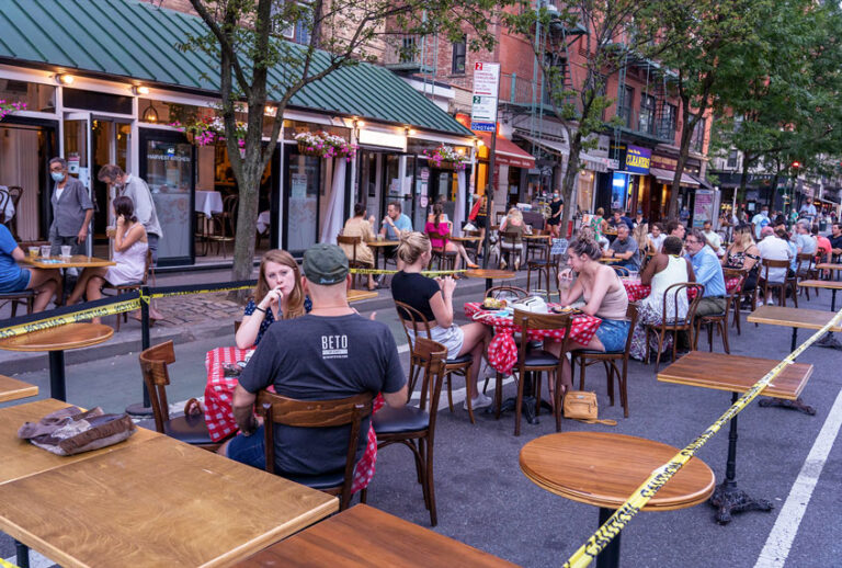 Harvest Kitchen restaurant has extended its outdoor area by setting tables on the street for their customers as the city moves into phase two re-opening from the coronavirus pandemic in New York City. New York State Governor Andrew Cuomo has announced that New York is on track for Phase 2 re-opening. (Ron Adar/SOPA Images/LightRocket via Getty Images)