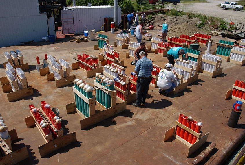 Pyrotechnicians prepare for a 4th of July fireworks show (David Greedy/Getty Images)