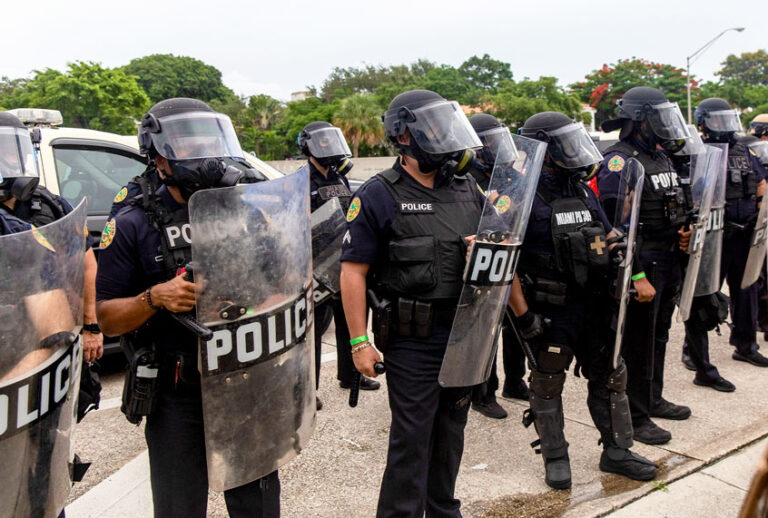 Riot police blocking the entrance to I-195 during the demonstration (Adam DelGiudice/SOPA Images/LightRocket via Getty Images)