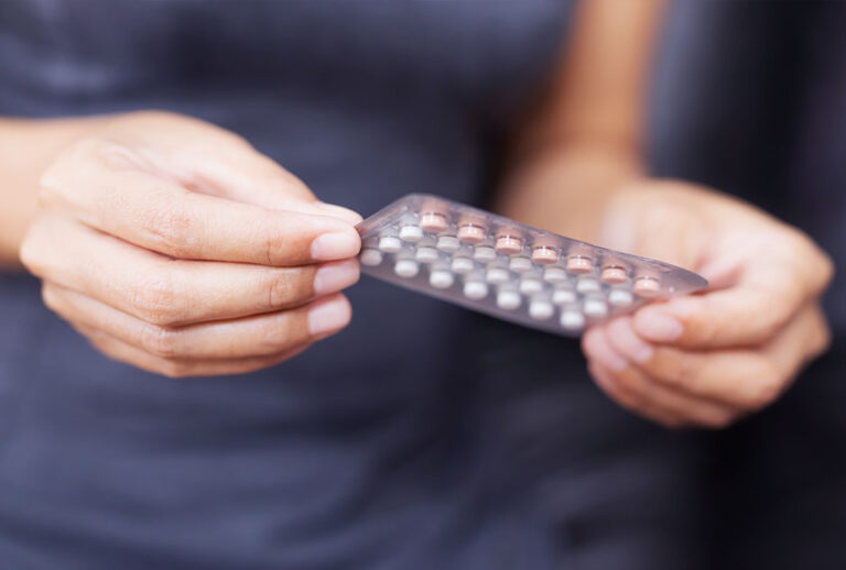 Woman Holding Blister Pack Of Pills (Getty Images)