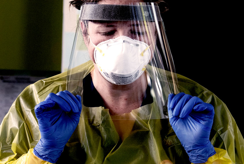 Staff of St Vincent's Hospital, Sydney, test patients at a new COVID-19 testing clinic at East Sydney Community and Arts Centre, April 17, 2020. (Louise Kennerley/The Sydney Morning Herald via Getty Images)
