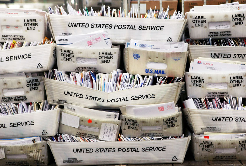 Stacks of boxes mail are seen at the U.S. Post Office (Justin Sullivan/Getty Images)