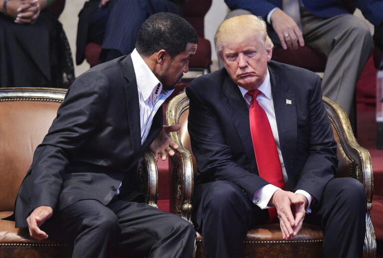 Republican presidential nominee Donald Trump (R) listens to pastor Darrell Scott during the Midwest Vision and Values Pastors and Leadership Conference at the New Spirit Revival Center in Cleveland Heights, Ohio on September 21, 2016. (MANDEL NGAN/AFP via Getty Images)