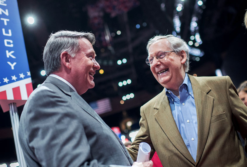 Senate Majority Leader Mitch McConnell, R-Ky., and Mike Duncan, former chairman of the Republican National Committee, talk on the floor of the Quicken Loans Arena in Cleveland, Ohio, a day before the start of the Republican National Convention, July 17, 2016. (Tom Williams/CQ Roll Call)