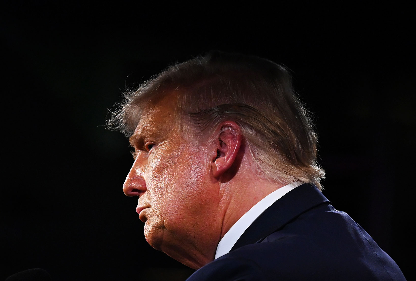 U.S. President Donald Trump listens during the first presidential debate against former Vice President and Democratic presidential nominee Joe Biden at the Health Education Campus of Case Western Reserve University on September 29, 2020 in Cleveland, Ohio. (Olivier Douliery-Pool/Getty Images)