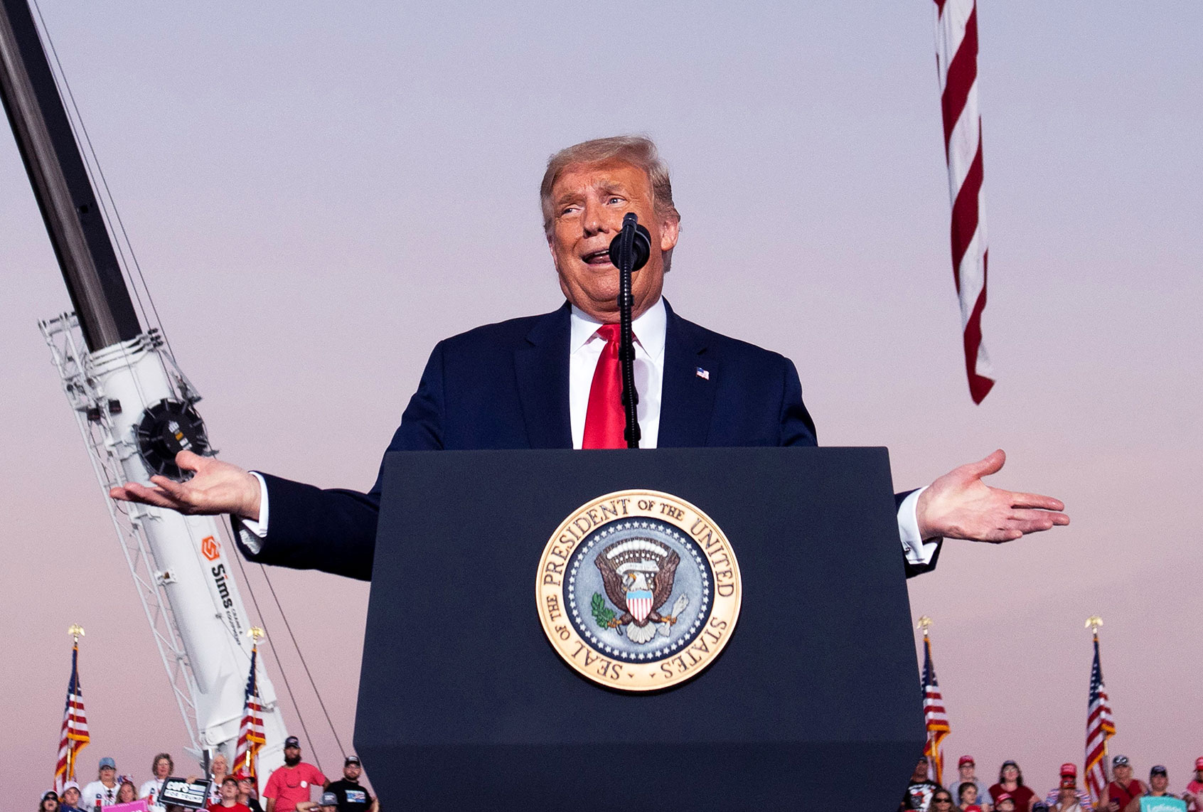 US President Donald Trump holds a Make America Great Again rally as he campaigns at Orlando Sanford International Airport in Sanford, Florida, October 12, 2020. (SAUL LOEB/AFP via Getty Images)