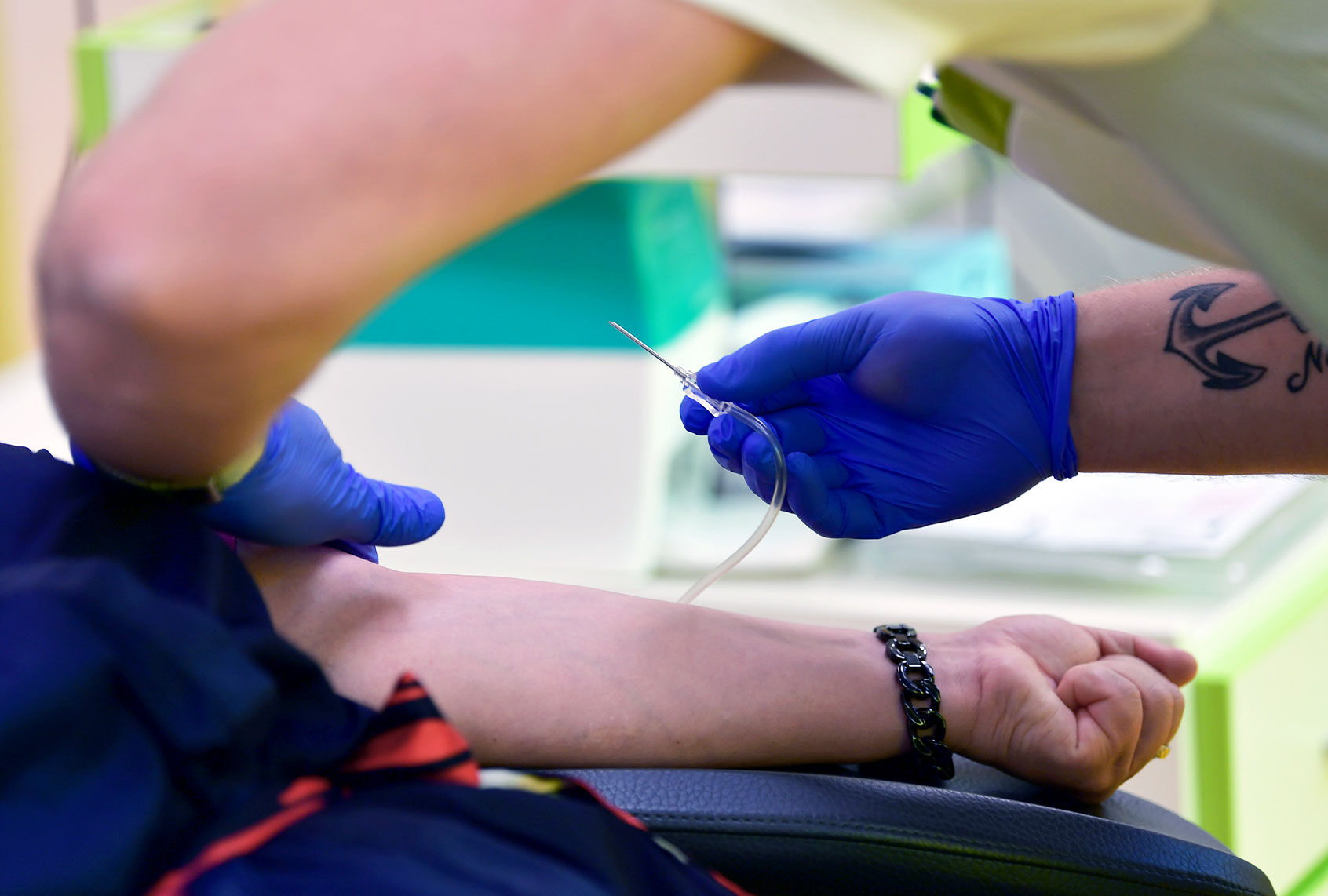 A needle is placed in the blood and plasma donation centre of the Institute for Transfusion Medicine Suhl. The Minister of Health has called on the Thuringians to donate blood. With the return of hospitals to regular operations, the need is also increasing again, she said. (Martin Schutt/picture alliance via Getty Images)