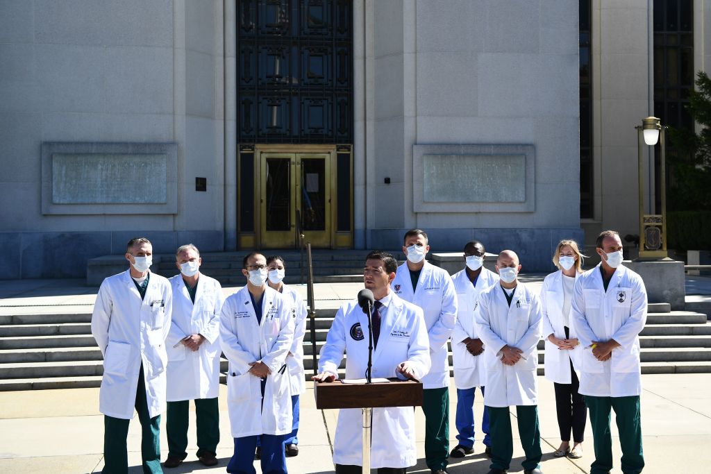 White House physician Sean Conley, with medical staff, gives an update on the condition of President Donald Trump, on Oct. 3, 2020, at Walter Reed Medical Center in Bethesda, Maryland. (Brendan Smialowski / AFP via Getty Images)