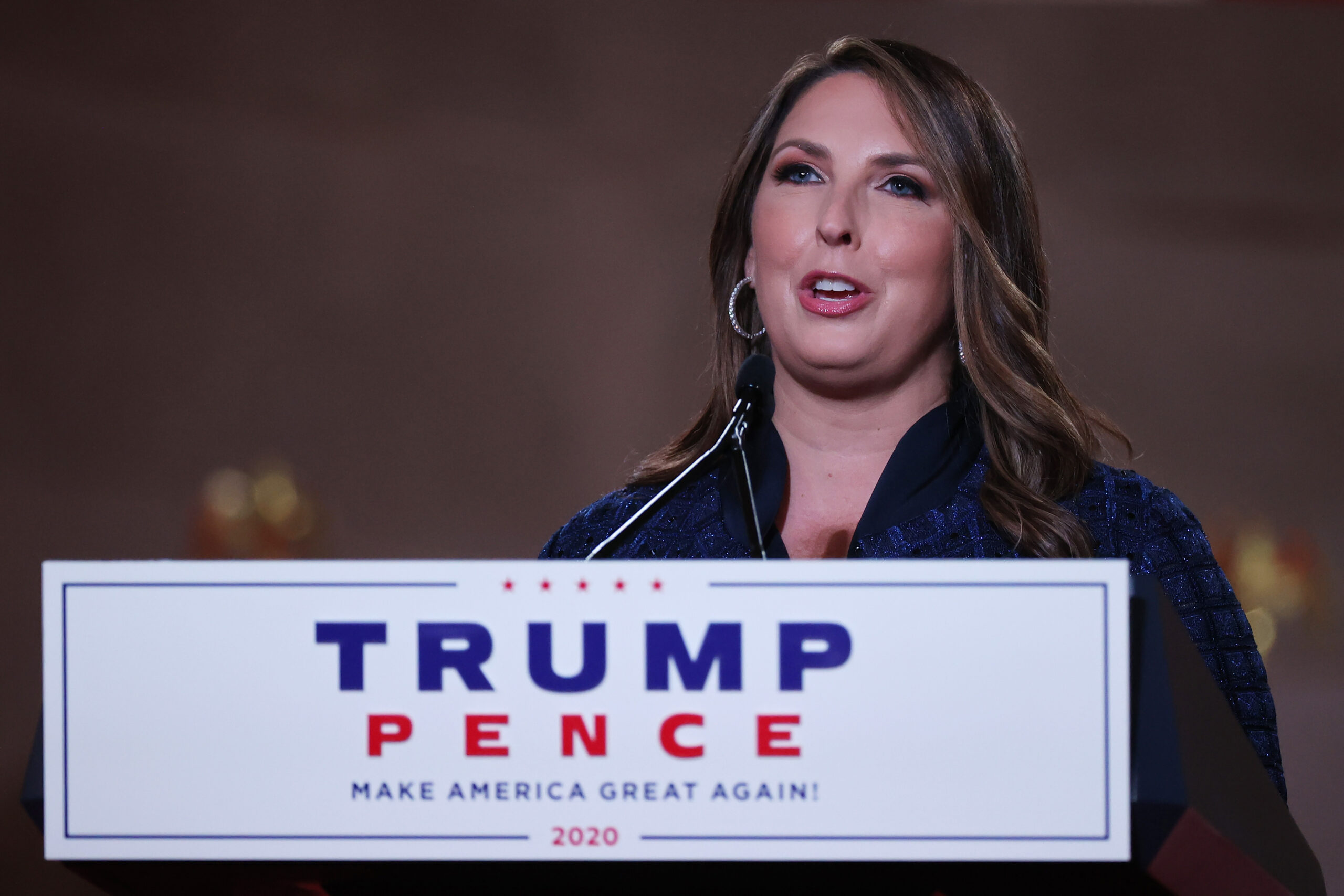 WASHINGTON, DC - AUGUST 24: Chair of the Republican National Committee Ronna McDaniel stands on stage in an empty Mellon Auditorium while addressing the Republican National Convention at the Mellon Auditorium on August 24, 2020 in Washington, DC. (Photo by Chip Somodevilla/Getty Images)