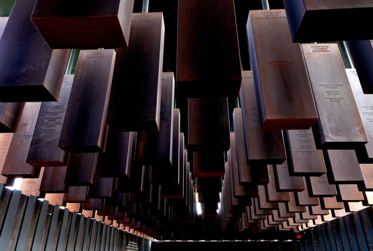 Over 800 corten-steel monuments, one for each county in the United States where a racial terror lynching took place with the names of the lynching victims engraved on the columns are on display at The National Memorial For Peace And Justice, the nations first memorial dedicated to the legacy of enslaved black people and people terrorized by lynching in Montgomery, Alabama on July 6, 2018. (Raymond Boyd/Getty Images)