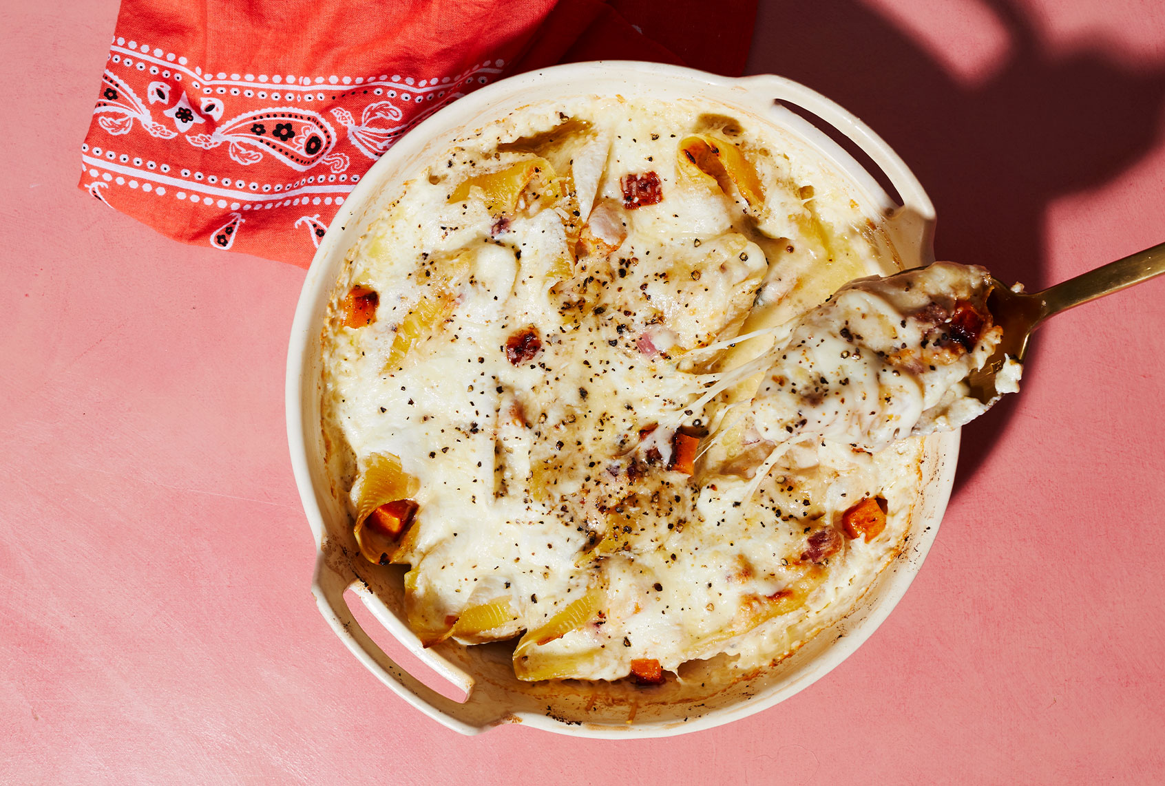BUTTERNUT SQUASH, RICOTTA, AND PANCETTA STUFFED SHELLS WITH BAKED BURRATA (Paul Sirisalee)