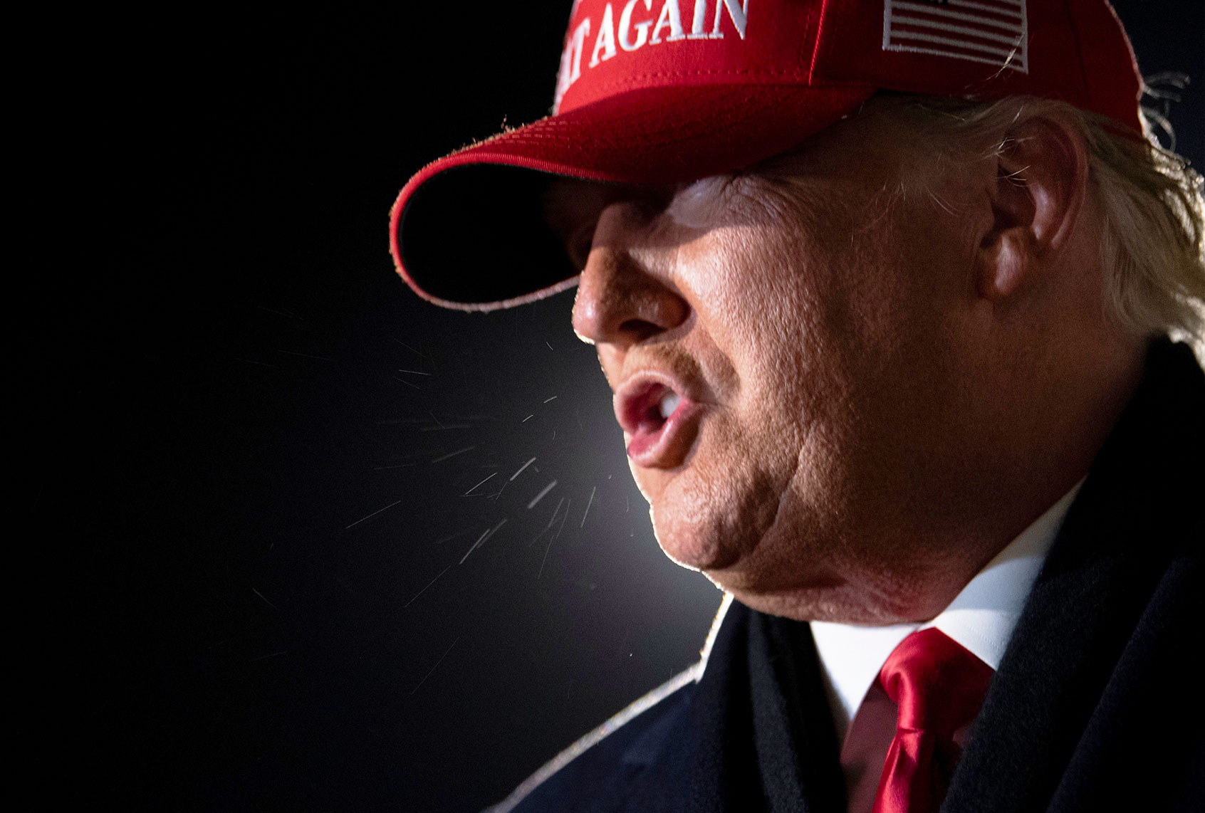 US President Donald Trump speaks to the press at General Mitchell International Airport November 2, 2020, in Milwaukee, Wisconsin. (BRENDAN SMIALOWSKI/AFP via Getty Images)