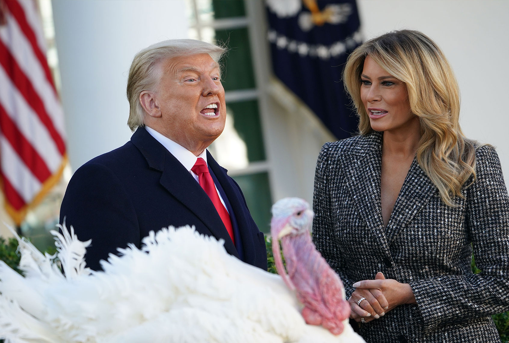 US President Donald Trump speaks after pardoning Thanksgiving turkey "Corn" as First Lady Melania Trump watches in the Rose Garden of the White House in Washington, DC on November 24, 2020. (MANDEL NGAN/AFP via Getty Images)