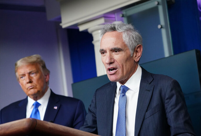 US President Donald Trump (L) listens to White House coronavirus adviser Dr. Scott Atlas speak during a press conference in the Brady Briefing Room of the White House on September 23, 2020, in Washington, DC. (MANDEL NGAN/AFP via Getty Images)