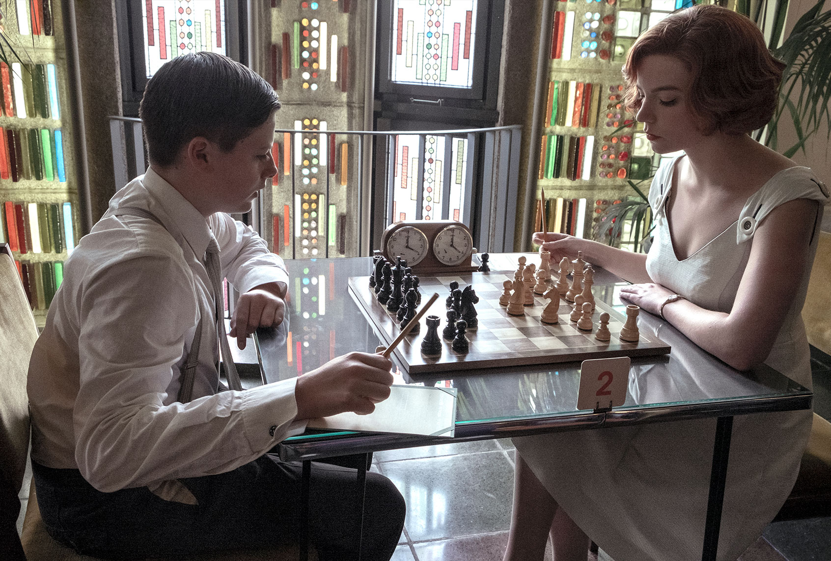 Louis Ashbourne Serkis and Anya Taylor-Joy in "The Queen's Gambit" (Netflix)