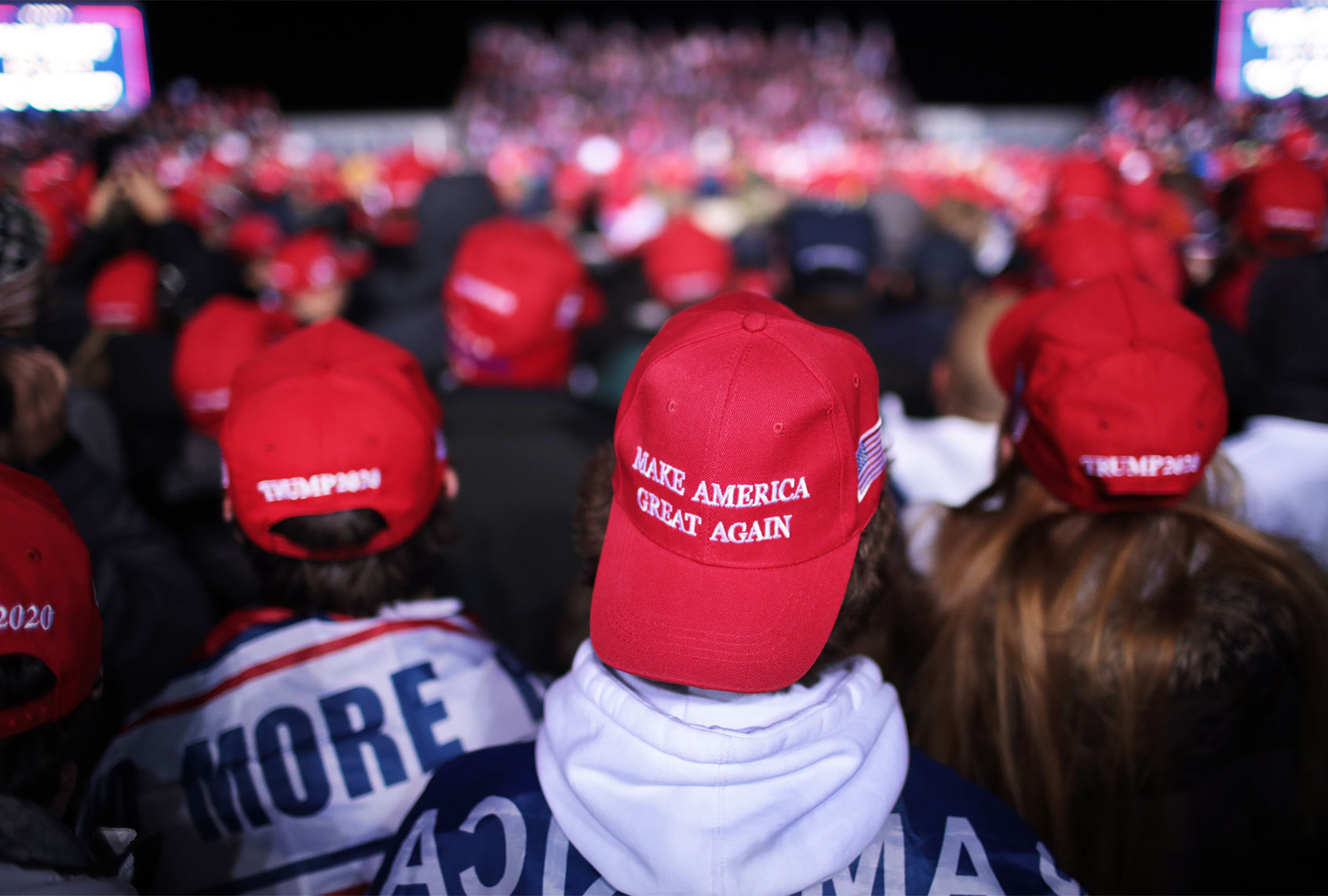 Supporters listen as President Donald Trump speaks during a campaign rally at the Kenosha Regional Airport on November 02, 2020 in Kenosha, Wisconsin. (Scott Olson/Getty Images)