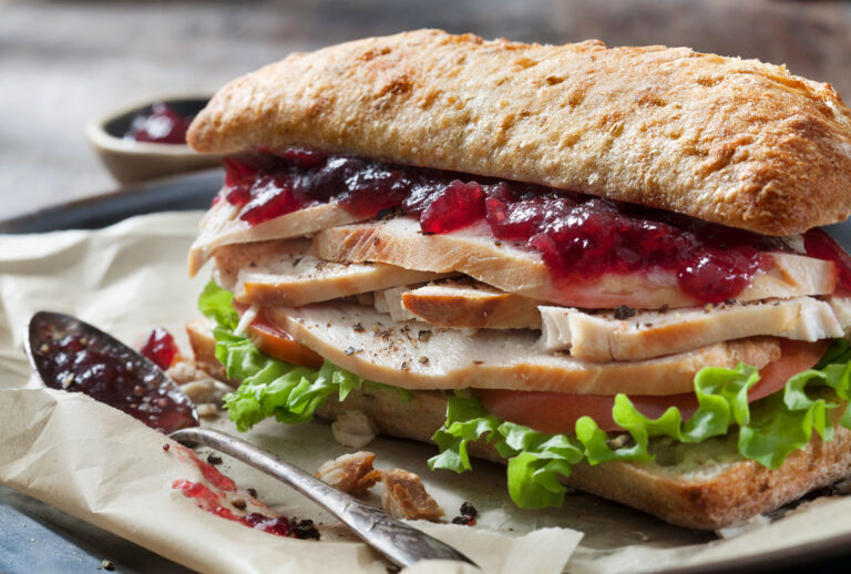 Leftover Roast Turkey Sandwich with Lettuce, Tomato and Cranberry Sauce on Ciabatta Bun (Getty Images)
