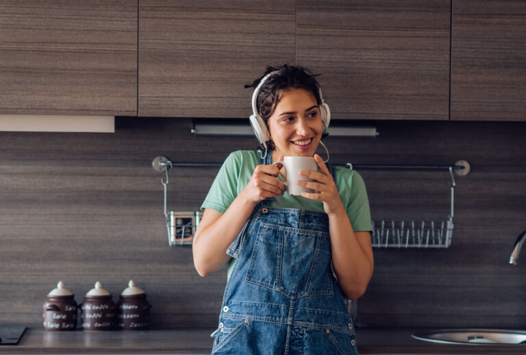 Woman enjoying music in the morning (Getty Images)
