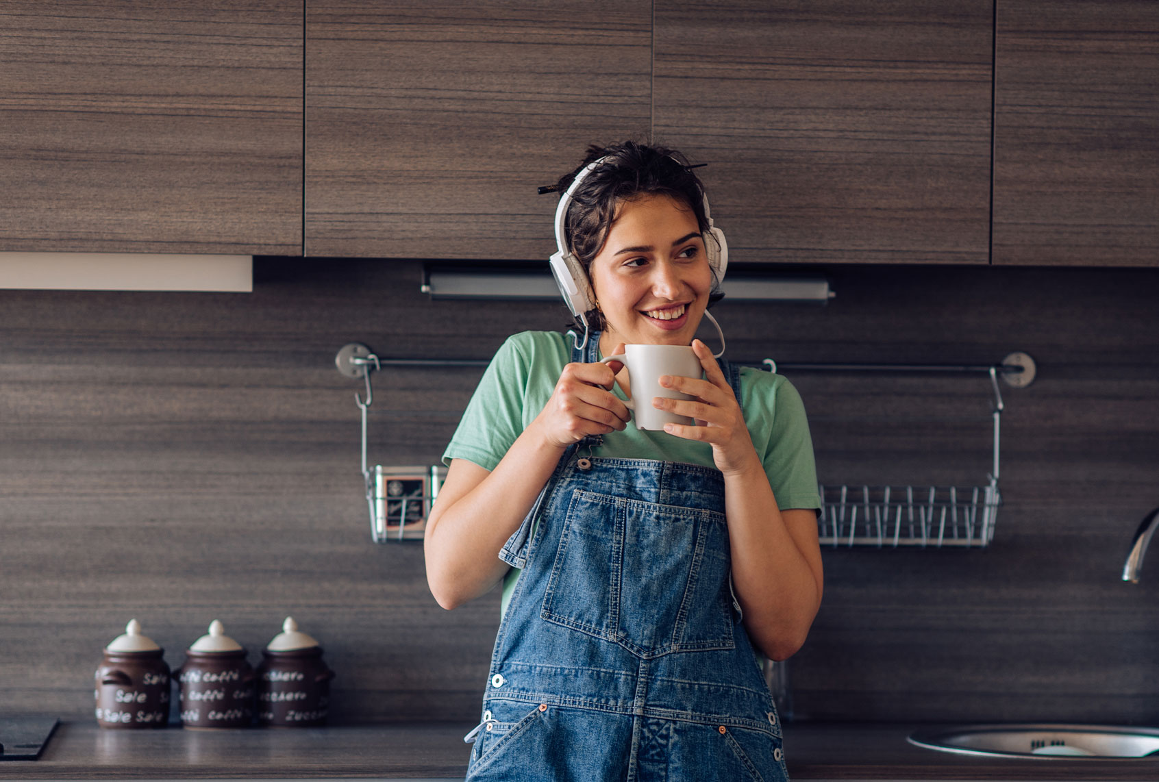 Woman enjoying music in the morning (Getty Images)