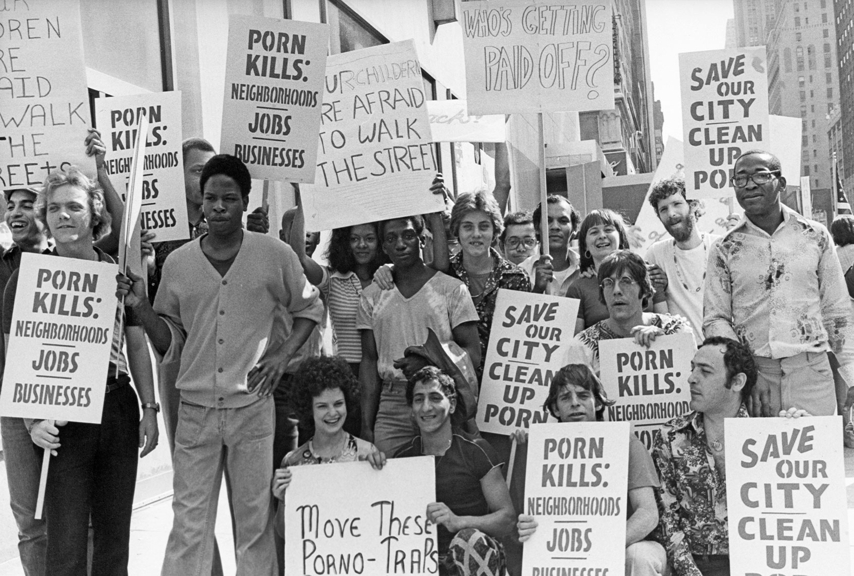 A group of anti pornography activists holding placards pose together during a protest in New York City, US, 1977. (Keystone/Getty Images)